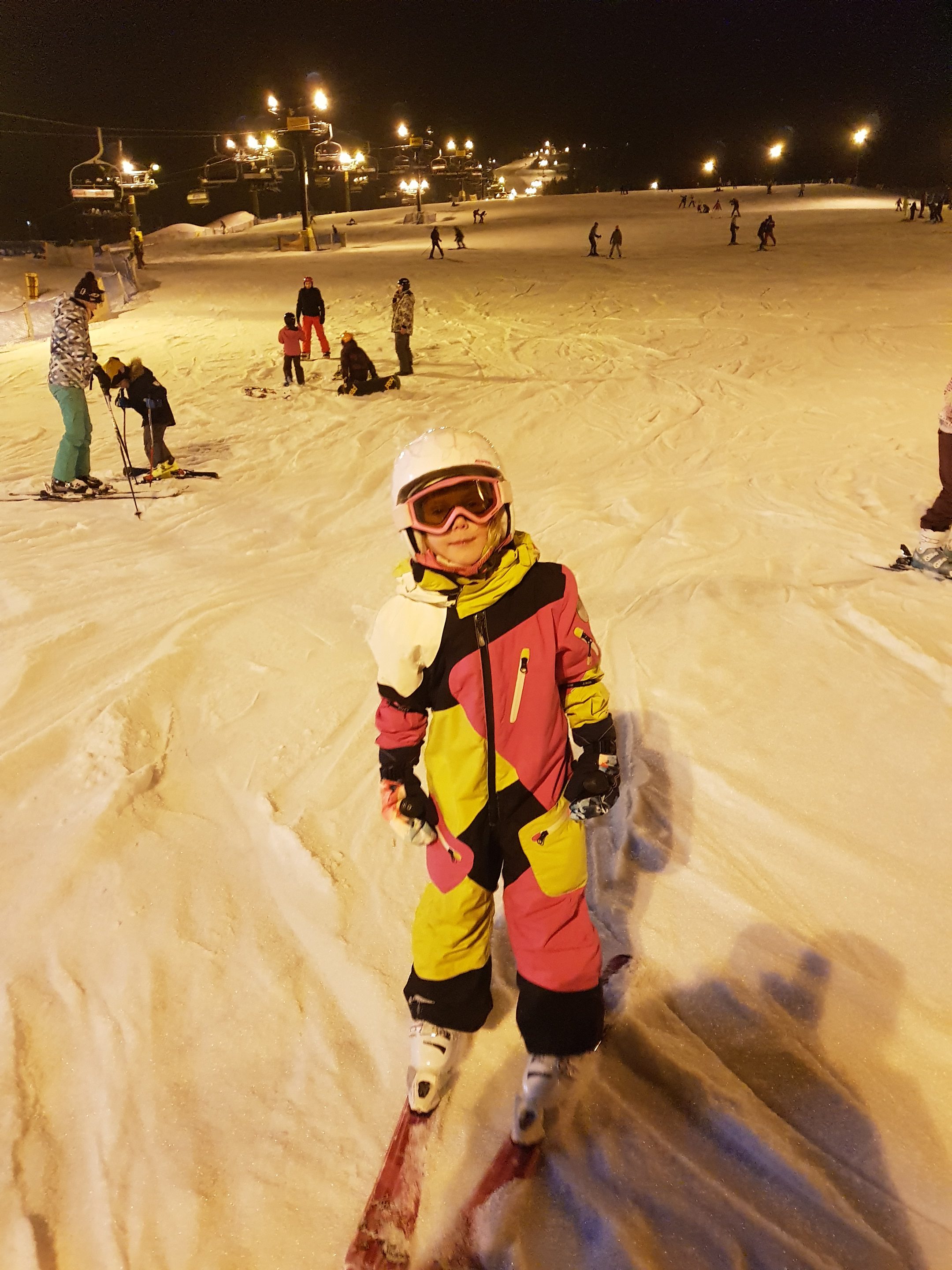 Little girl child skiing in Poland